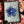 Load image into Gallery viewer, Sparkly Spinning Flower Pendant - Blue

