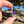 Load image into Gallery viewer, Flower Pendant with Cubic Zirconia Center Purple Satin
