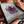 Load image into Gallery viewer, Small Sparkly Spinning Flower Pendant - Royal Jelly
