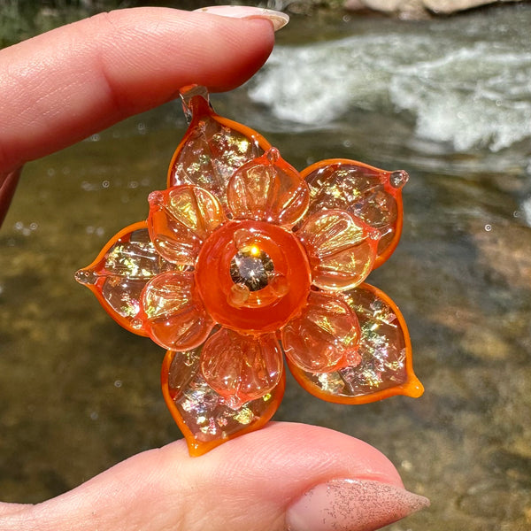 Sparkly Spinning Flower Pendant - Transparent Orange w/ Cubic Zirconia Center