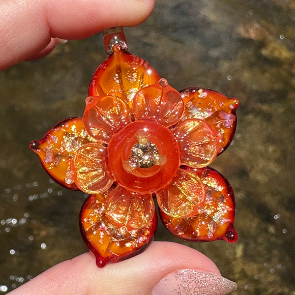 Sparkly Spinning Flower Pendant - Opaque Red/Orange w/ Cubic Zirconia Center