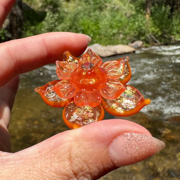 Sparkly Spinning Flower Pendant - Transparent Orange w/ Cubic Zirconia Center