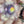 Load and play video in Gallery viewer, Small Sparkly Spinning Flower Pendant - Lilac
