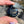 Load image into Gallery viewer, Moon Spinner Black with Green Sparkle
