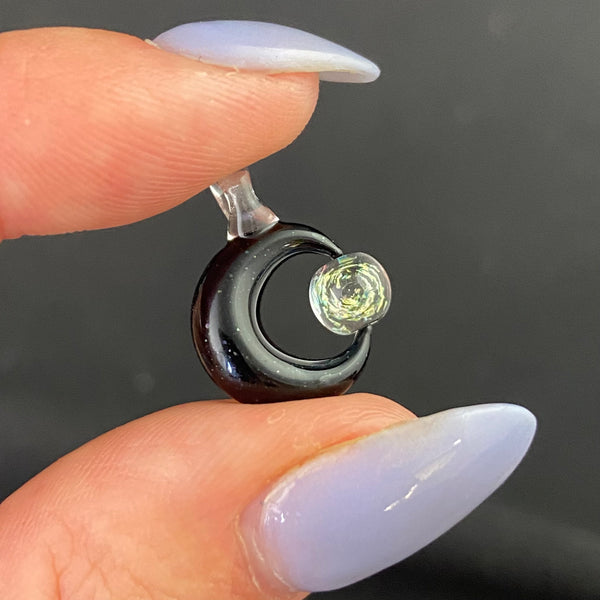 Tiny Moon Spinner in Black Galaxy